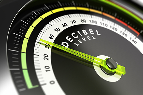 Decibel measurement. Gauge with green needle pointing 30 dB, concept of noise reduction