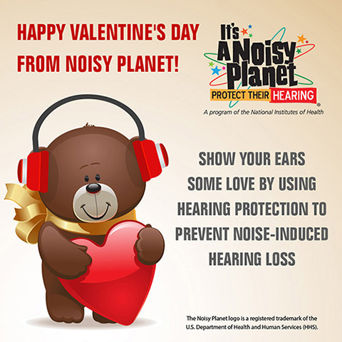 A cartoon teddy bear holding a Valentine's Day heart wears earmuffs to protect his hearing.