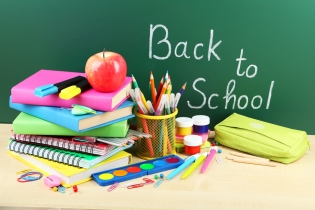 Back to school supplies on a table.