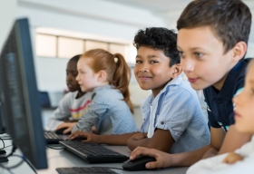 Children using computer in school.